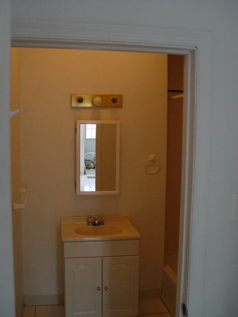 Kitchen looking into bath